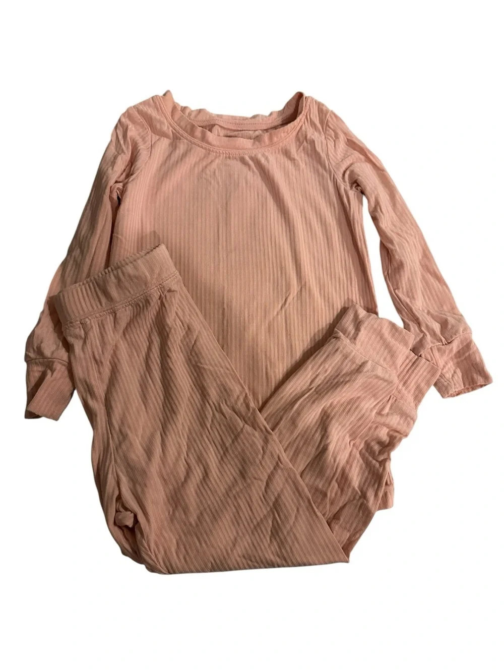 This Little Sleepies pajama set is made from pink ribbed bamboo fabric.